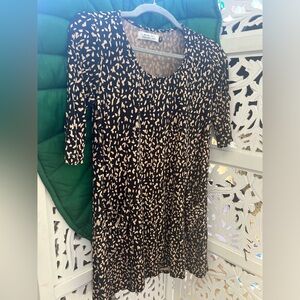 Ava Sky Hawaii black and peach baby doll dress with front pockets. Size XS.